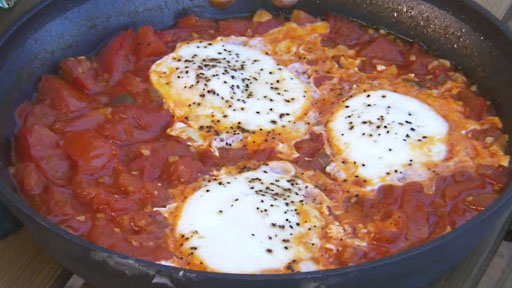 Eggs Poached in Tomatoes aka "Shakshooka" Screenshot from America's Heartland Season 8 Episode 13